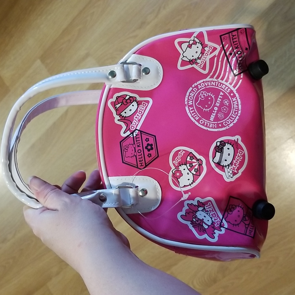 Hello Kitty pink and white around the world print mini bowling bag NWOT